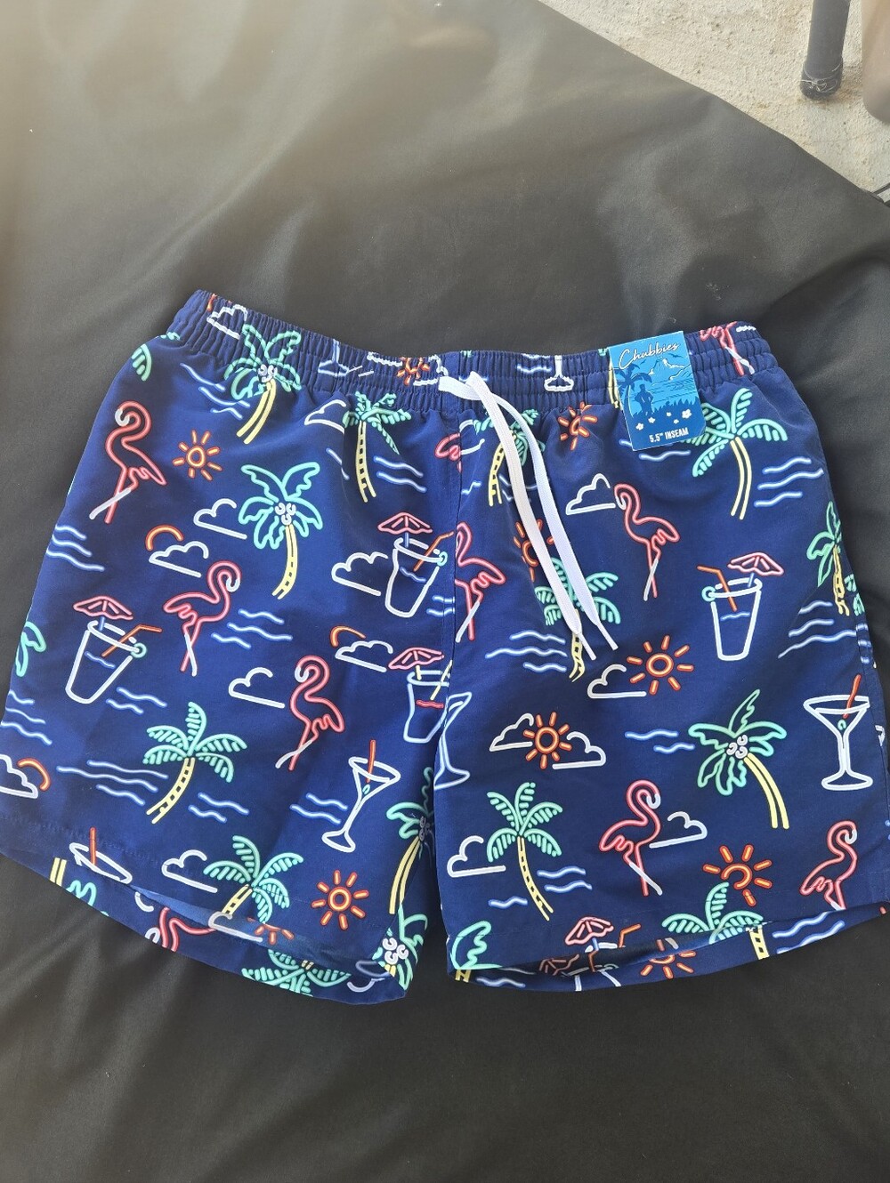 chubbies Navy Swim Shorts with Neon Tropical Icons